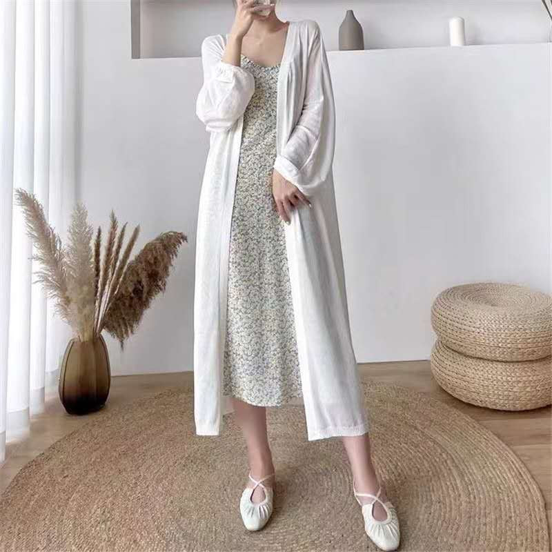 Cardigan long élégant pour femmes avec des manches en forme de ballon et un devant ouvert Chic & Stil