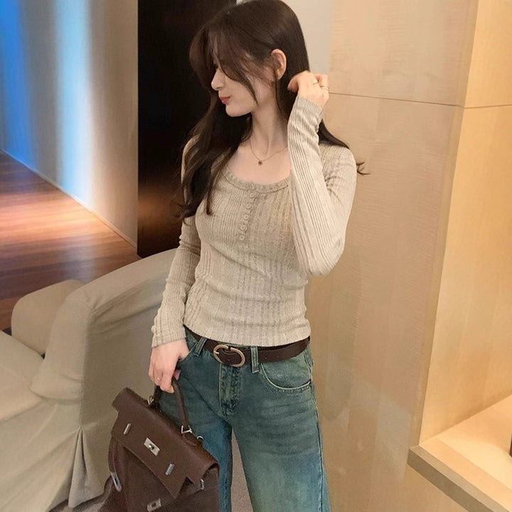 Women's fitted rib top with button detail