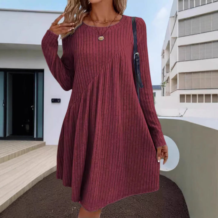 Casual knitted dress for women with long sleeves and asymmetrical hem Lune London