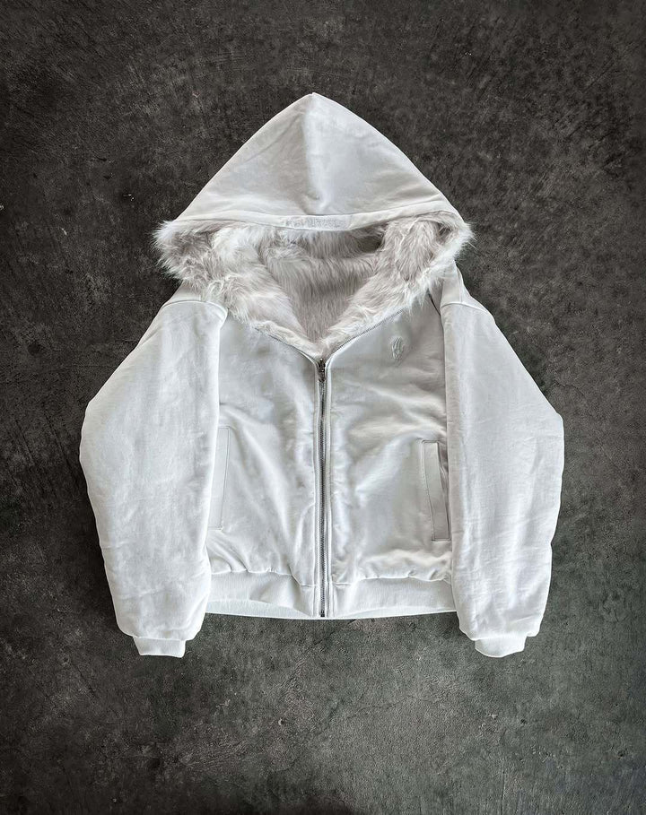 Veste d'hiver pour femmes avec capuche doublée en fausse fourrure et poches pratiques Chic & Stil