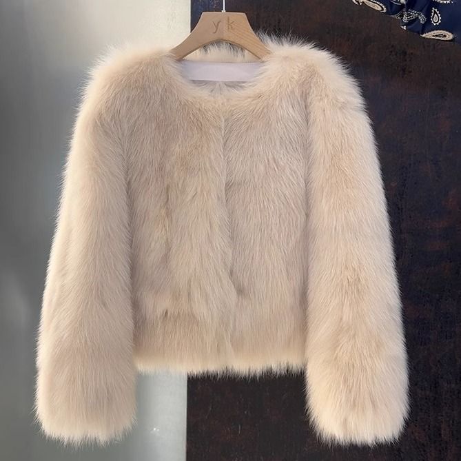 Veste élégante en fausse fourrure pour femmes avec coupe courte Chic & Stil