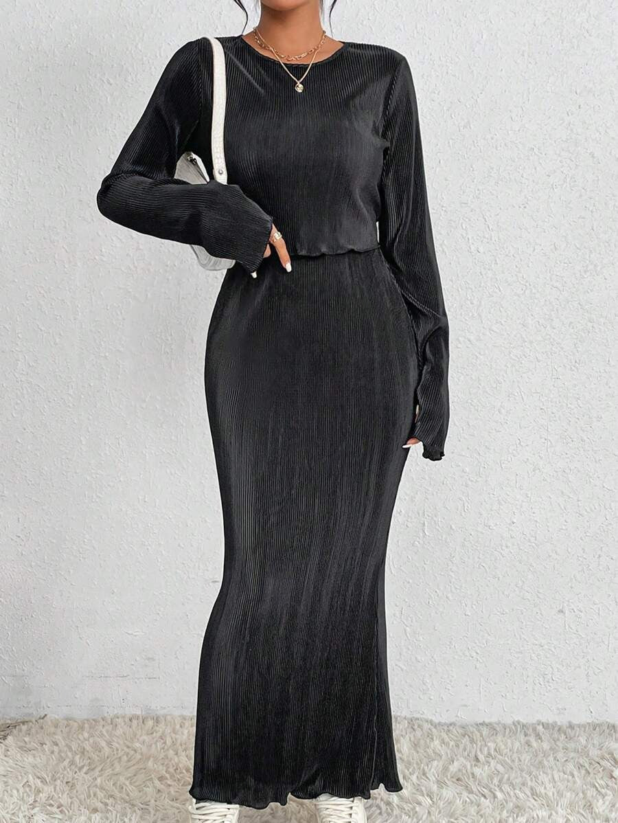 Robe maxi élégante et cintrée pour dames avec des manches longues Chic & Stil
