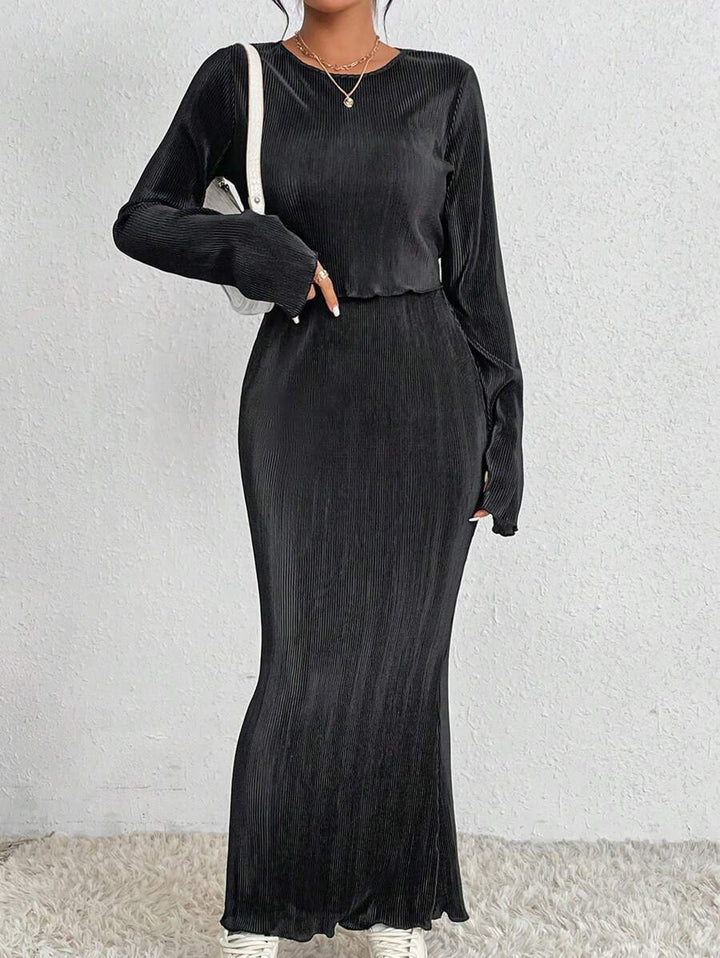 Robe maxi élégante et cintrée pour dames avec des manches longues Chic & Stil