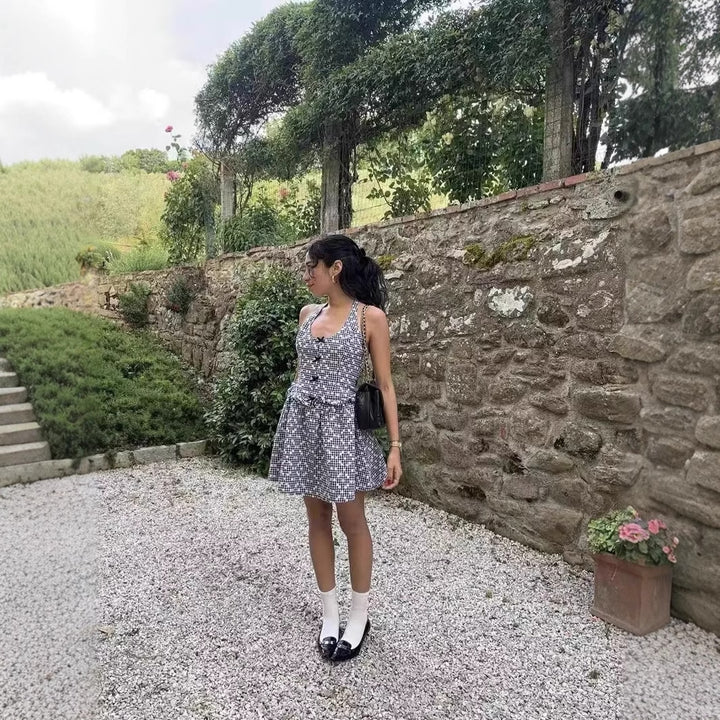 Leisure dress for ladies with a playful backless design and a floral plaid pattern Lune London