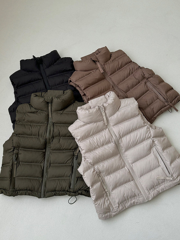 Ladies quilted gilet with adjustable drawstring waist and practical pockets Lune London