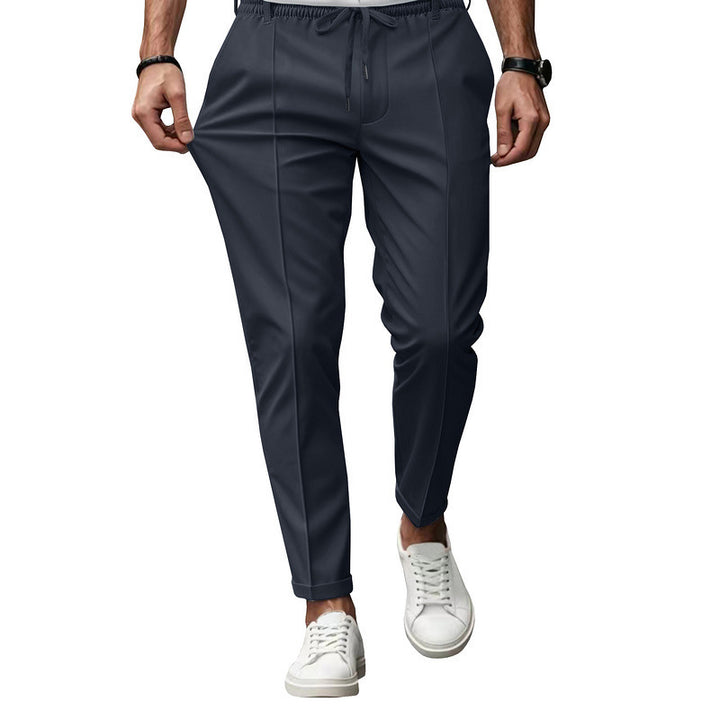 Men's fashionable sports pants with elastic waistband and practical welt pockets Lune London