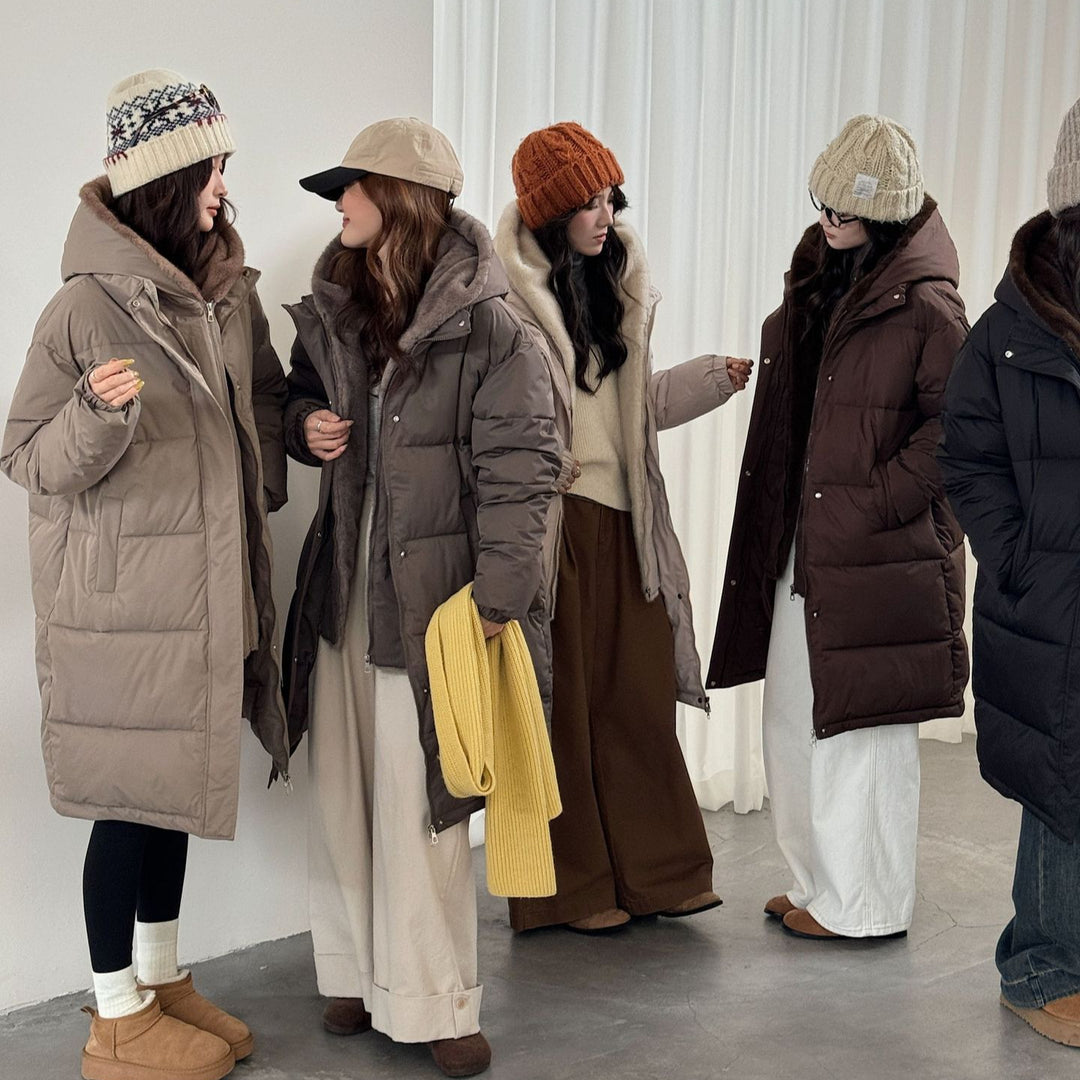 Ladies elegant winter padded parka with faux fur collar and practical pockets Lune London