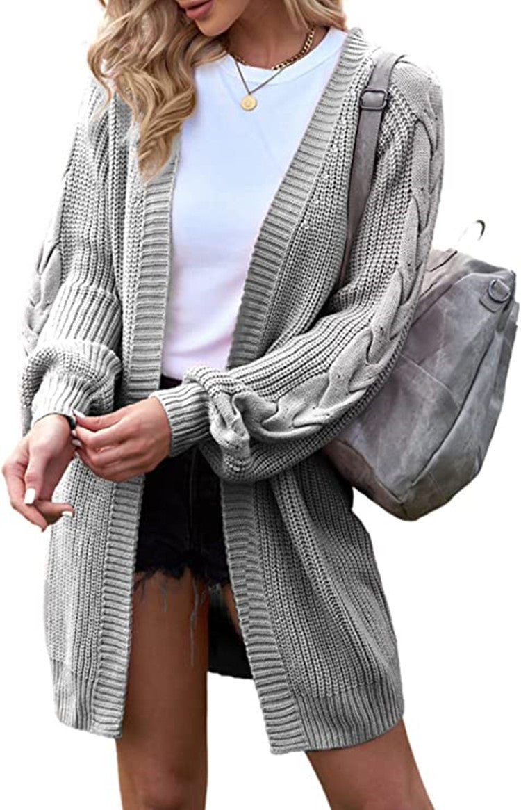 Cardigan knitted for women with voluminous sleeves and cable knit details Lune London
