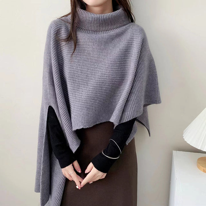 Ladies knitted poncho with high collar and elegant ribbed texture Lune London