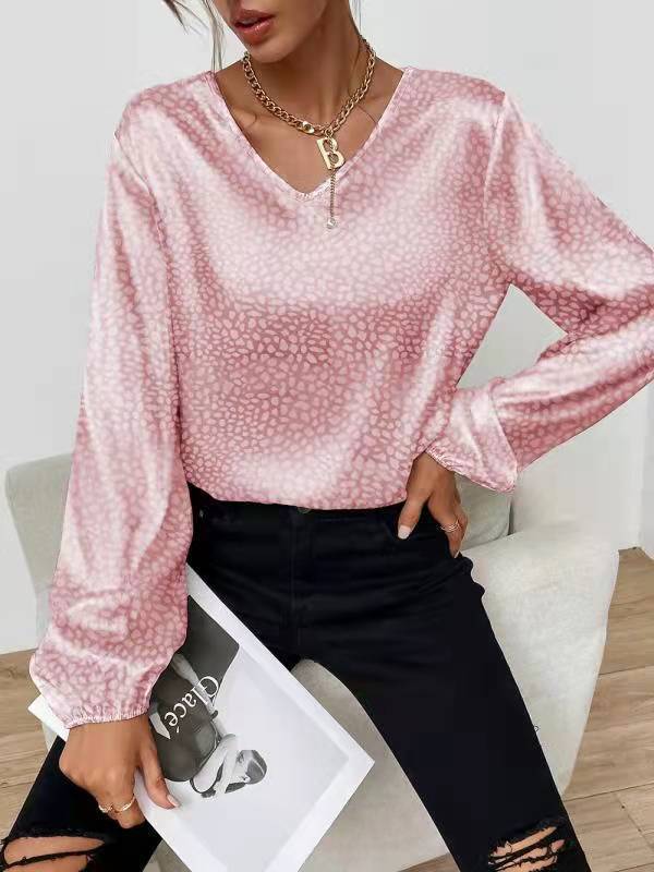 Blouse élégante pour femmes avec col en V et manches volumineuses Chic & Stil