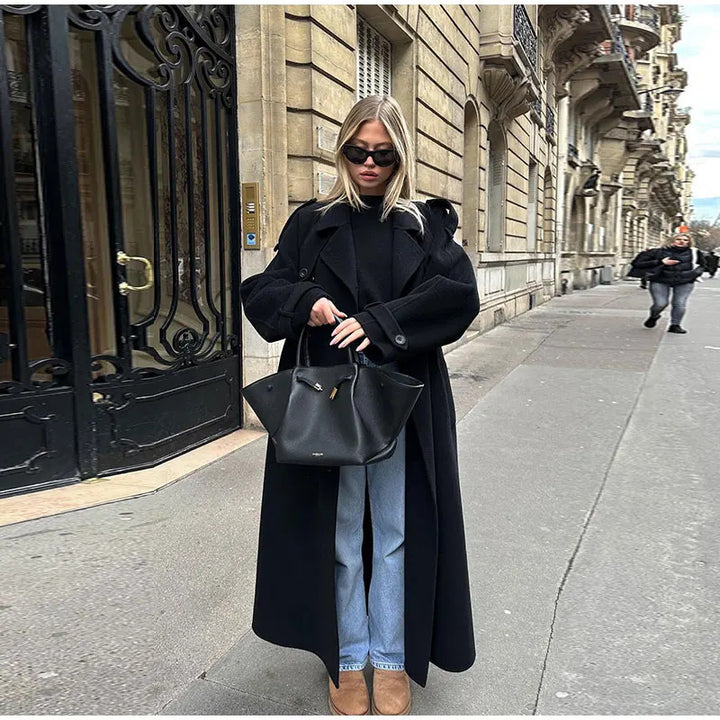 Ladies elegant long trench coat with modern cut and practical pockets Lune London