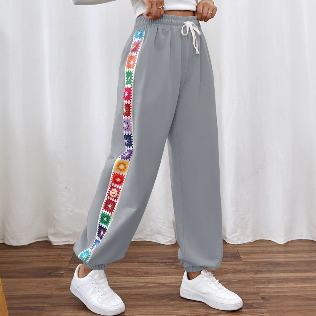 Leisure pants for women with a colorful floral pattern and an elastic waistband Lune London