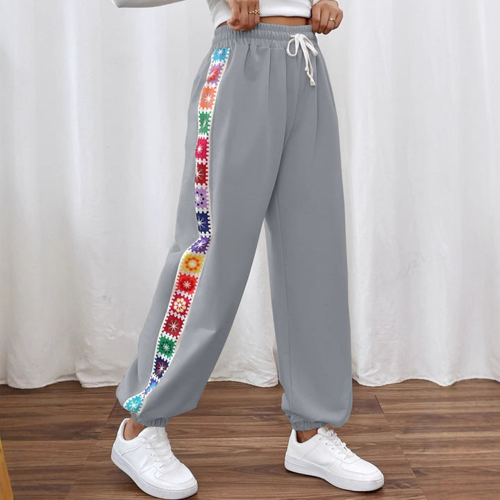 Leisure pants for women with a colorful floral pattern and an elastic waistband Lune London