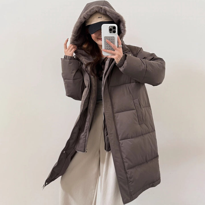 Ladies elegant winter padded parka with faux fur collar and practical pockets Lune London