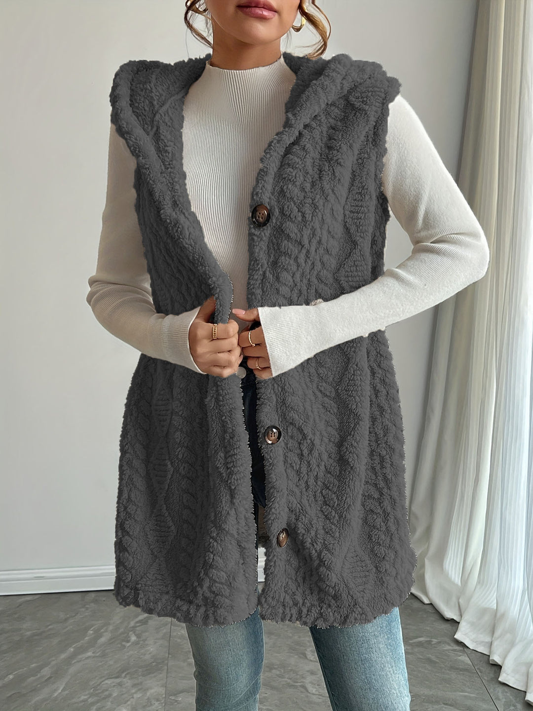 Women’s hooded vest in soft fabric with button placket Chic und Stil