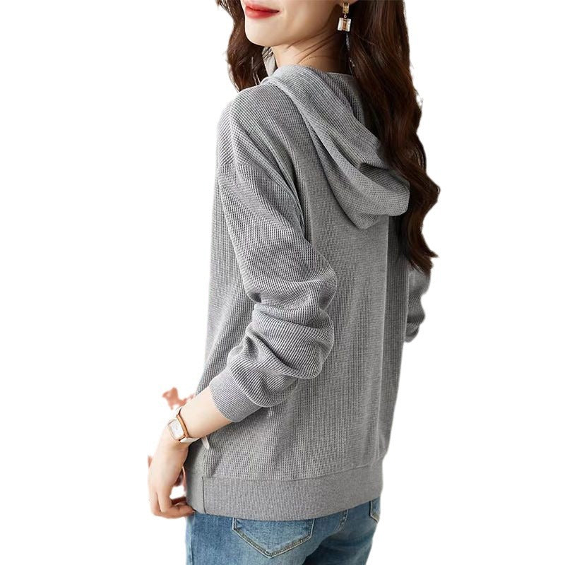 Hoodie féminin à la mode avec design texturé Chic & Stil