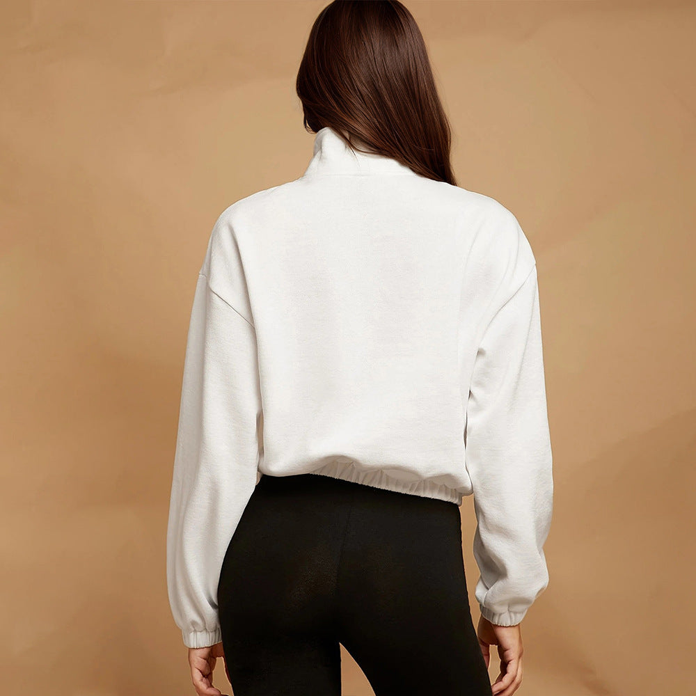 Haut de survêtement zippé décontracté pour femmes avec poche kangourou et ourlet élastique Chic & Stil