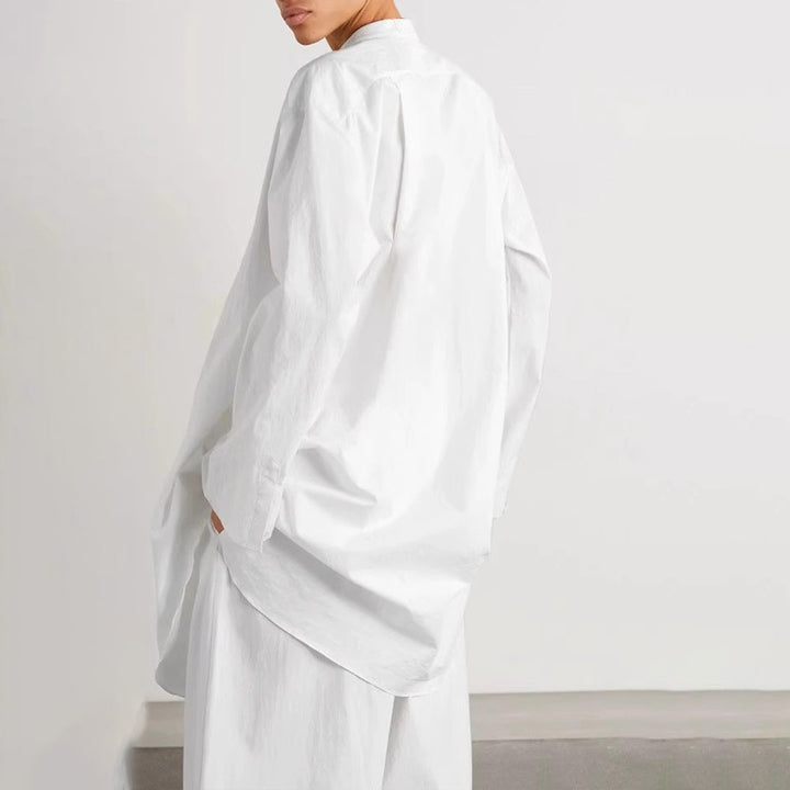 Blouse de mode femme avec col rond et coupe asymétrique Chic & Stil
