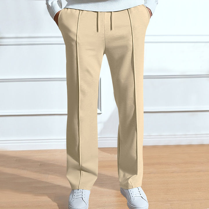 Men's leisure pants with elastic waistband and side snap buttons Lune London