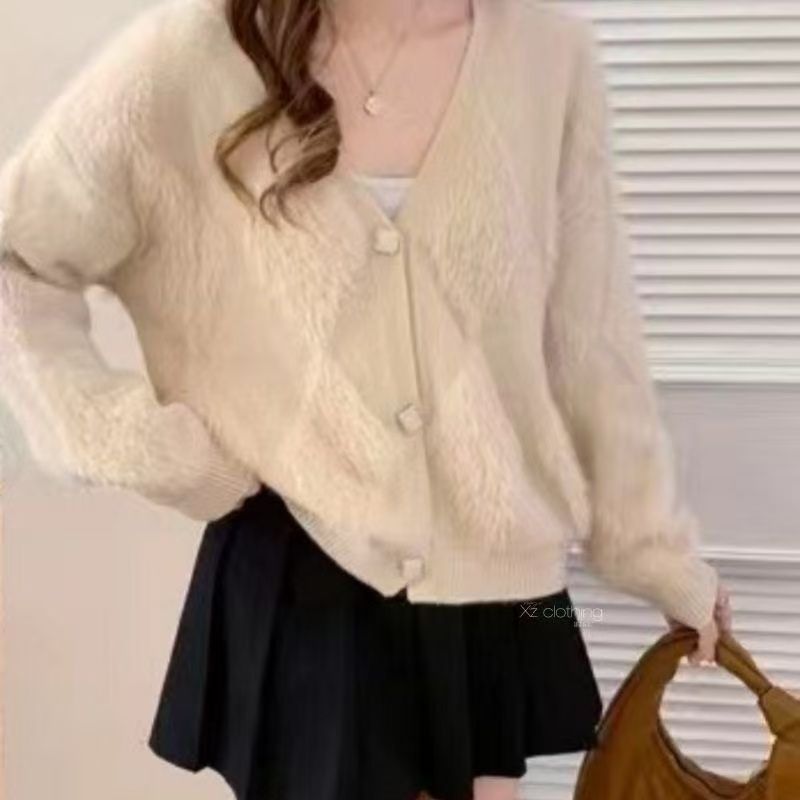 Cardigan femme en peluche avec détails boutonnés Chic & Stil