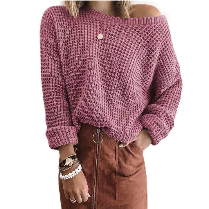 Oversized casual style knitted sweater for women with an off-shoulder design.