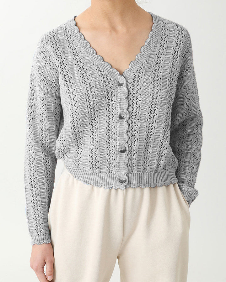 Knitted cardigan for women with feminine ruffles and button details Lune London
