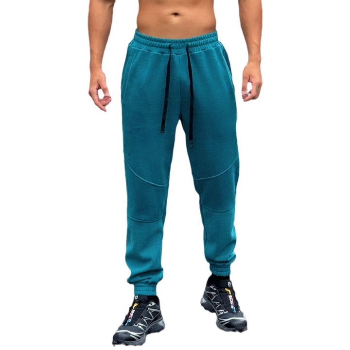 Men's sporty jogging pants with elastic waistband and practical side pockets Lune London