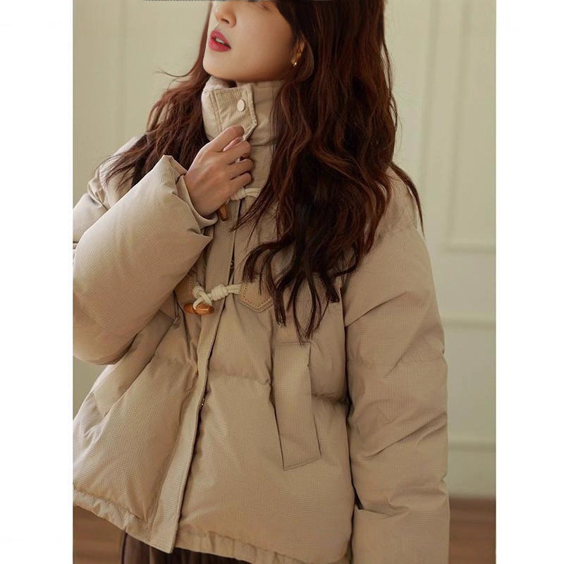 Veste matelassée oversize pour femme avec col haut et détails de bouton Chic & Stil