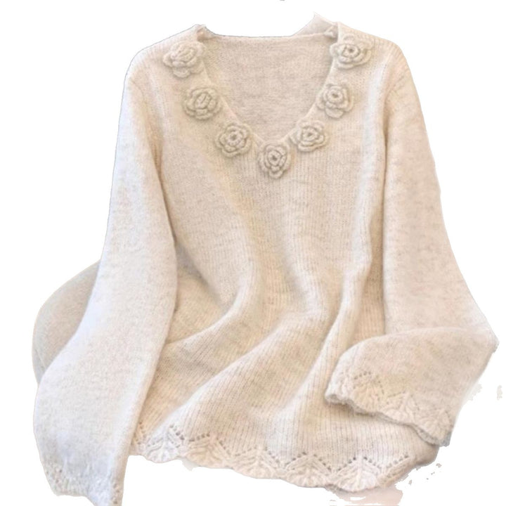 Pull en maille pour femmes avec accents floraux Chic & Stil
