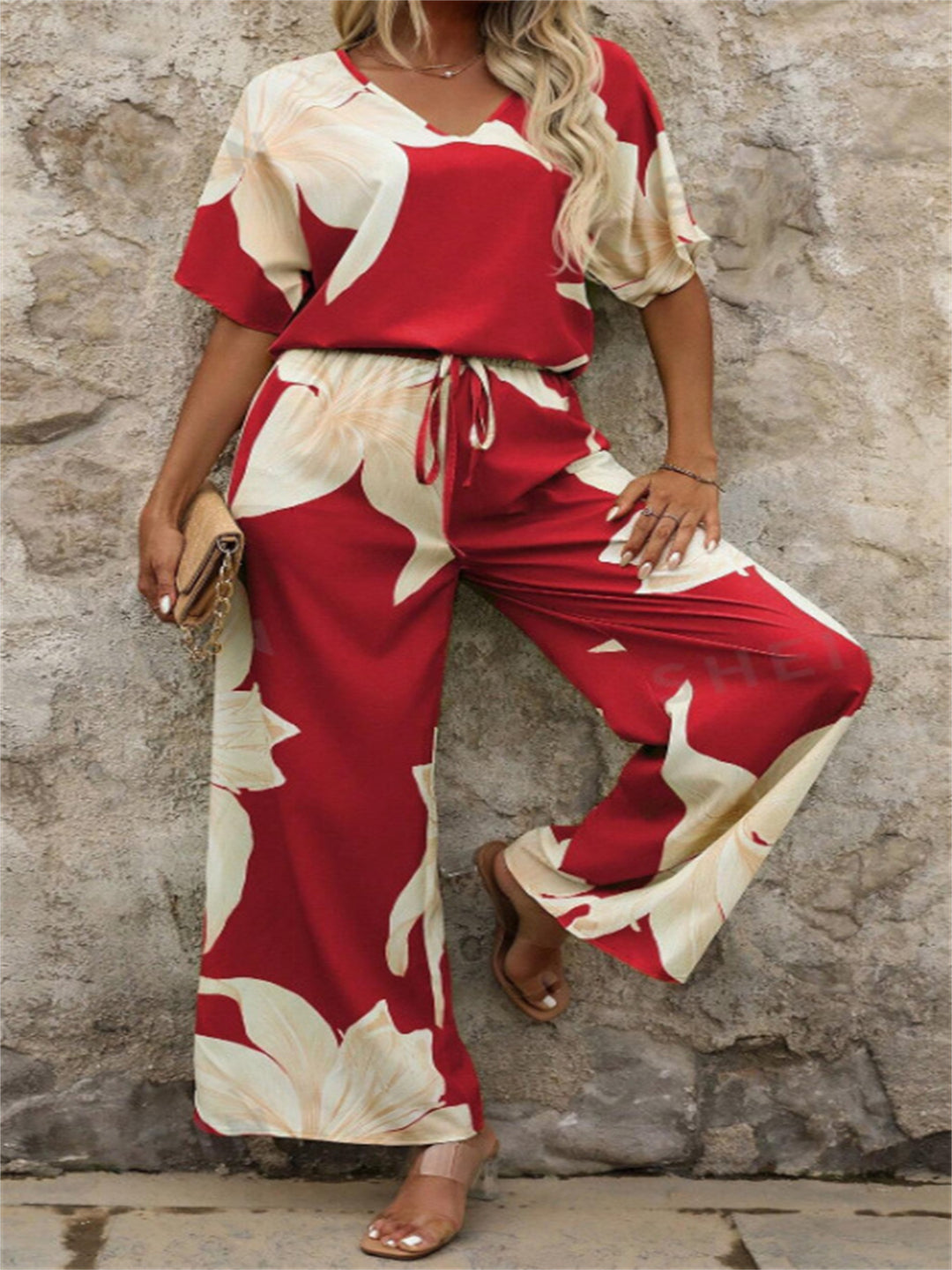 Ladies Elegant Jumpsuit with floral patterns and wide leg Lune London