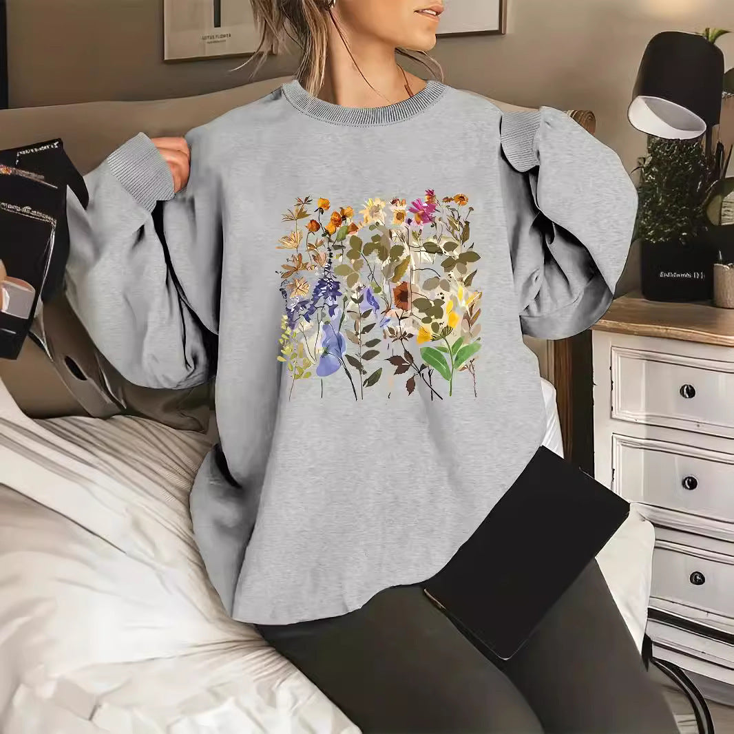 Sweat-shirt pour femmes avec motifs floraux et coupe confortable Chic & Stil