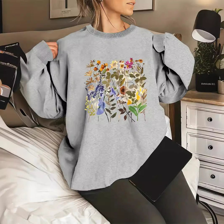 Sweat-shirt pour femmes avec motifs floraux et coupe confortable Chic & Stil