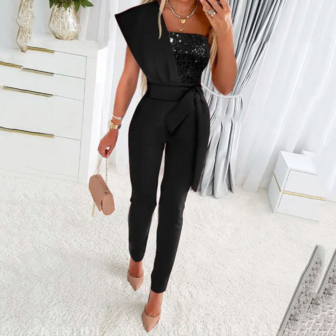 One-shoulder jumpsuit for women with a sparkling top and a chic waist belt und Stil