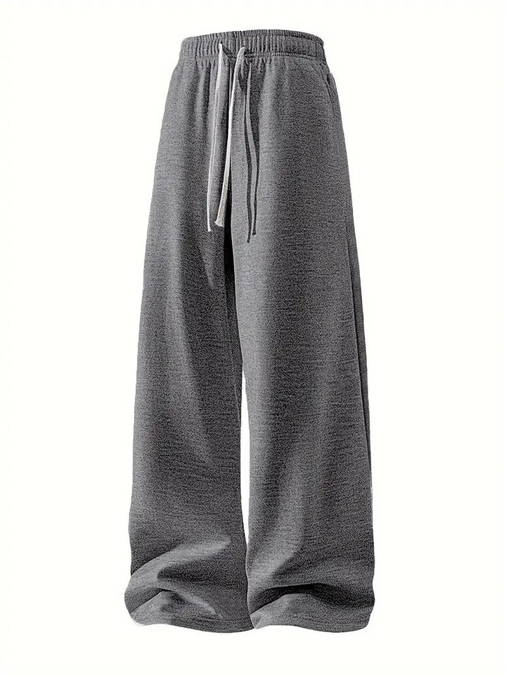 Women's casual loose-fit leisure pants with elastic waistband and practical pockets Chic & Stil