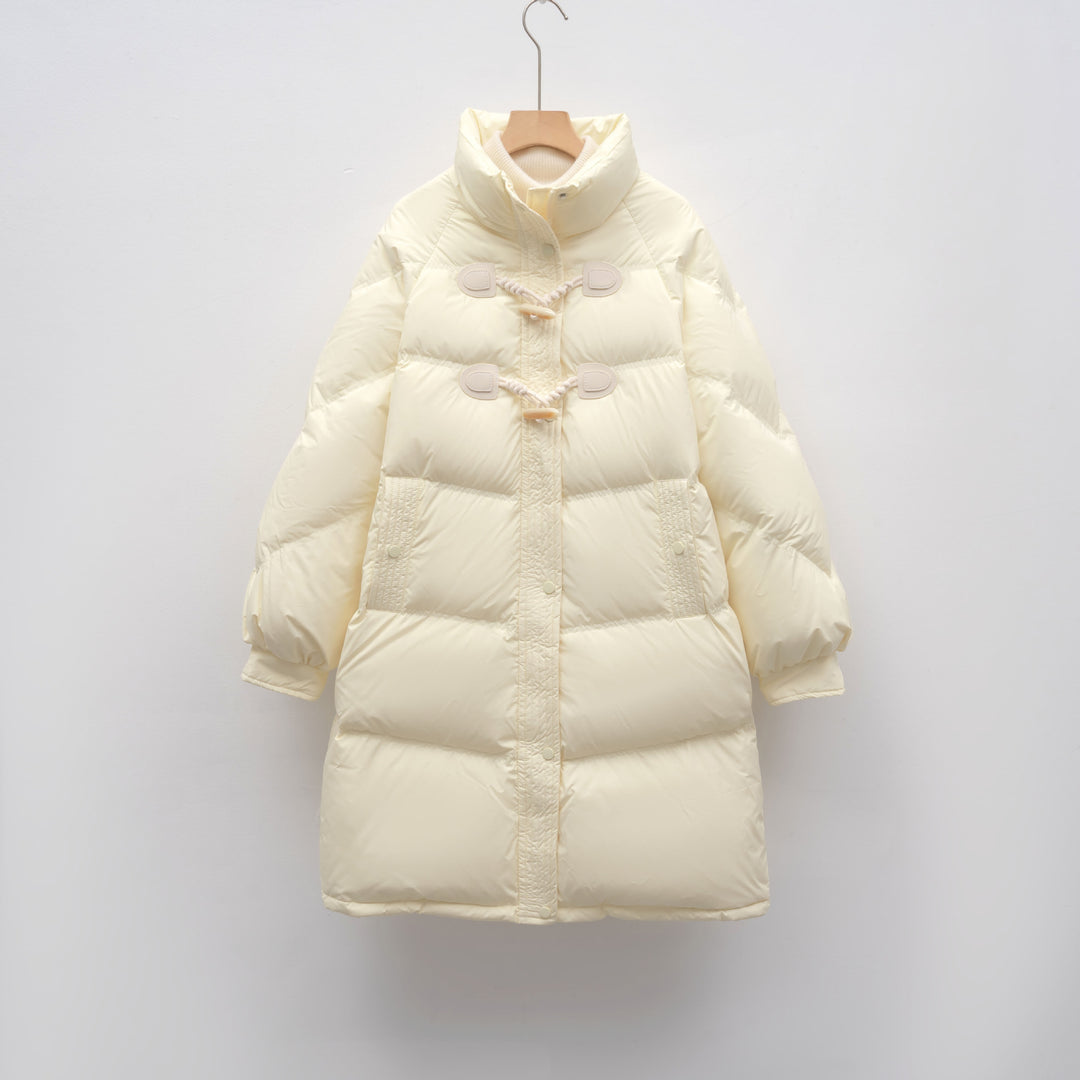 Elegant long coat for women with integrated buttons and a voluminous cut Lune London