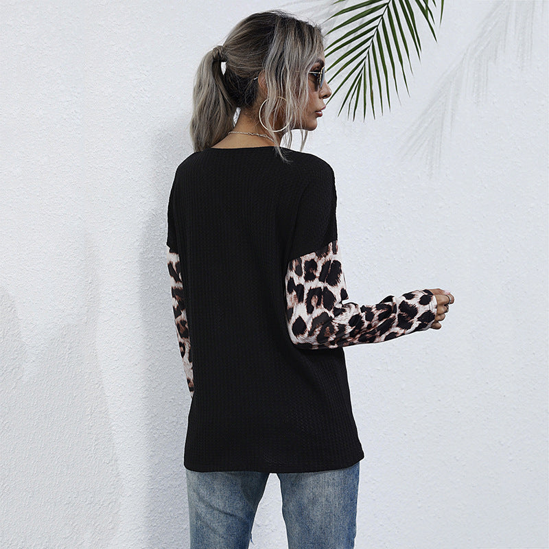 Wrapped top for women with leopard sleeves Lune London