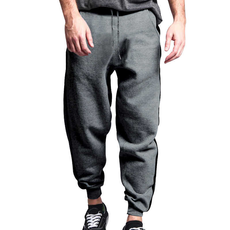 Sporty men's jogger pants with contrasting side stripes and an elastic waistband Lune London