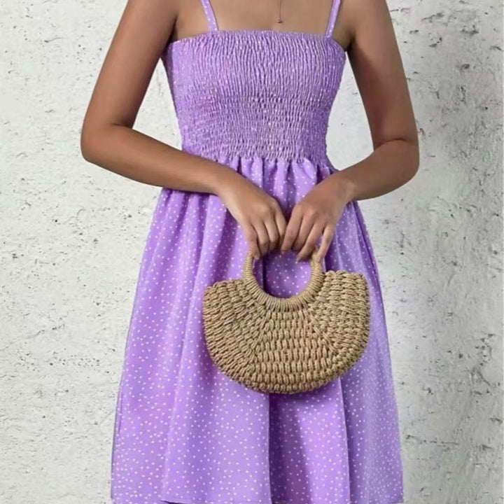 Halter neck dress for women with an airy silhouette and a lovely polka dot pattern Lune London