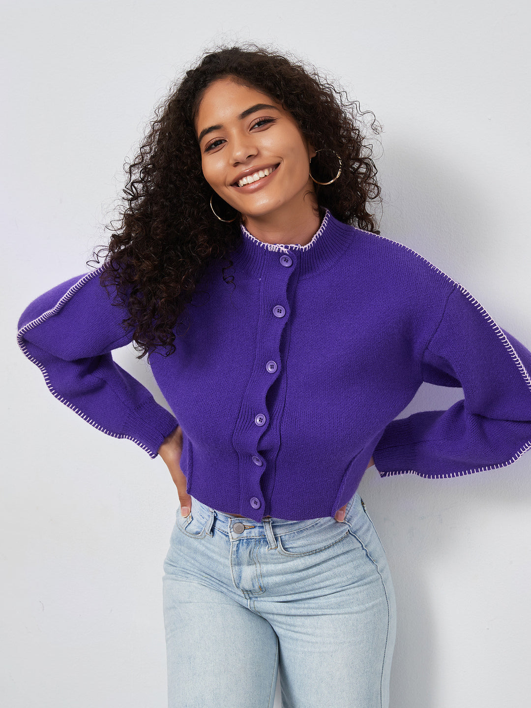 Cropped knitted jacket for women with decorative button details Lune London