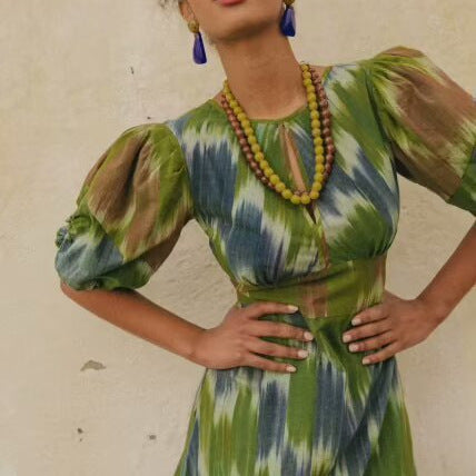 Maxi dress for ladies with elegant gather and modern puff sleeves Lune London
