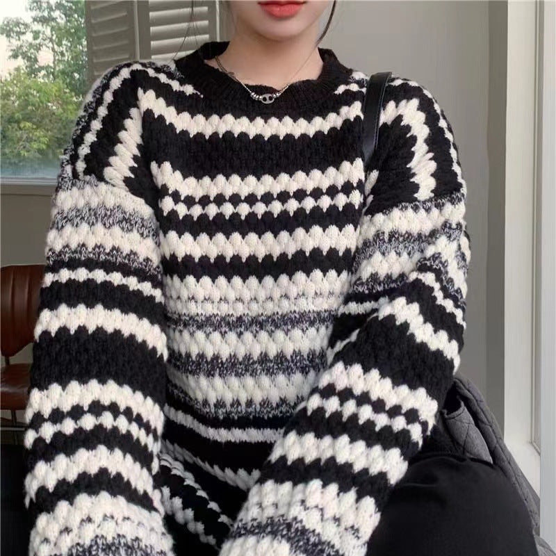 Knitted patterned sweater for women with textured fabric and relaxed fit Lune London