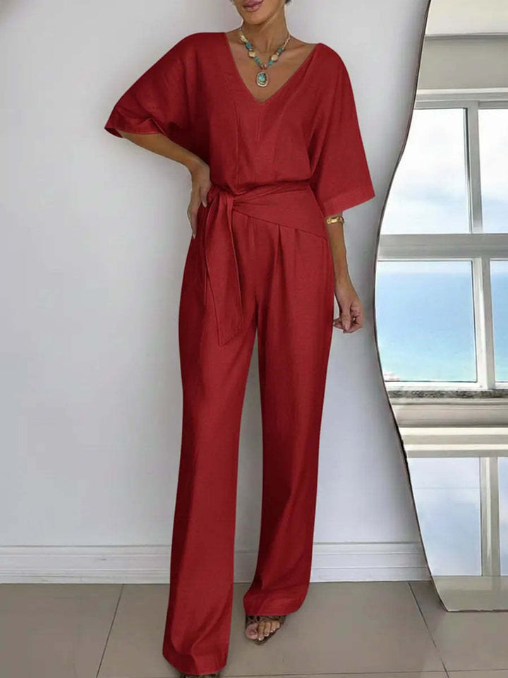 Women Elegant Jumpsuit with Tailored Cut and Wrap Belt Chic & Stil