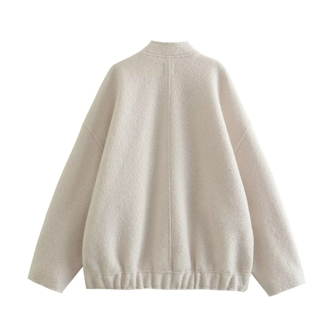 Ladies oversized fluffy coat with practical pockets and an elegant high collar Lune London