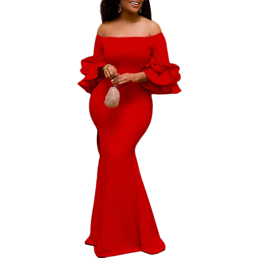 Elegant evening dress for ladies with dramatic ruffles and a side slit Lune London