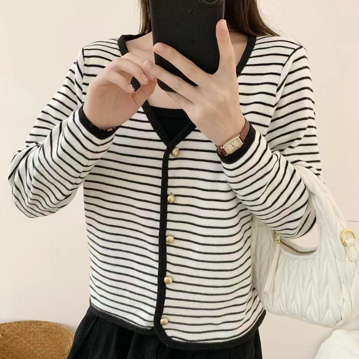 Ladies striped cardigan with elegant buttons and modern V-neck