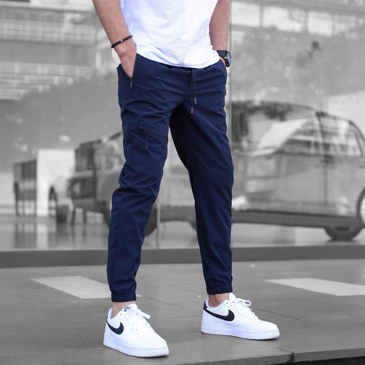 Sport suit trousers for men with elastic waistband and zip pockets on the sides Lune London