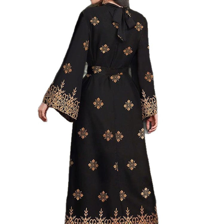 Evening party dress for women with an elegant gold and floral pattern Lune London