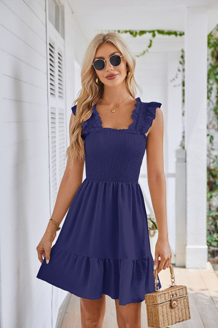 Summer mini dress for women with ruffle details and a fitted cut Lune London