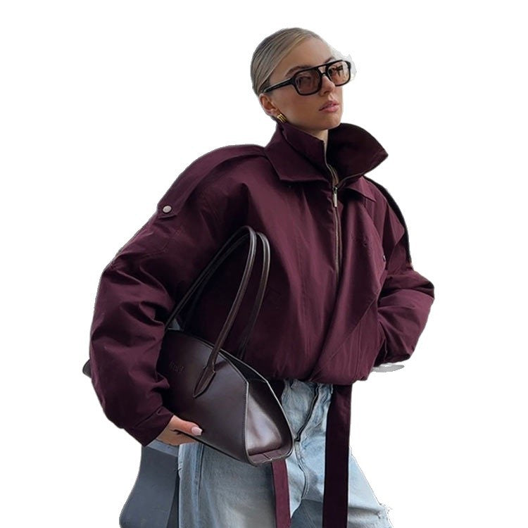 Modern oversized jacket for ladies with a high collar and a waist belt Lune London
