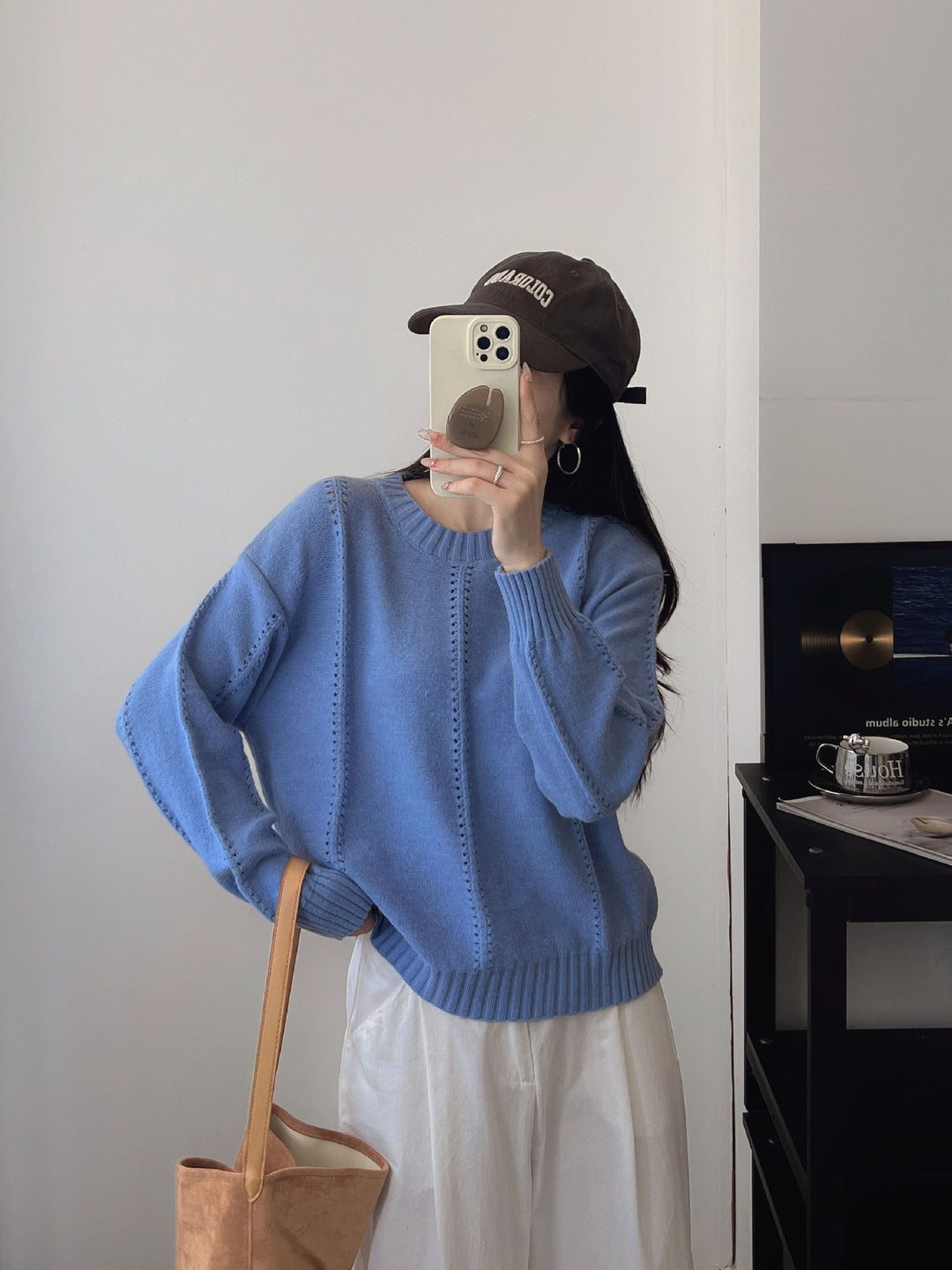 Pull en maille épaisse pour femmes avec une silhouette féminine et un design texturé Chic & Stil